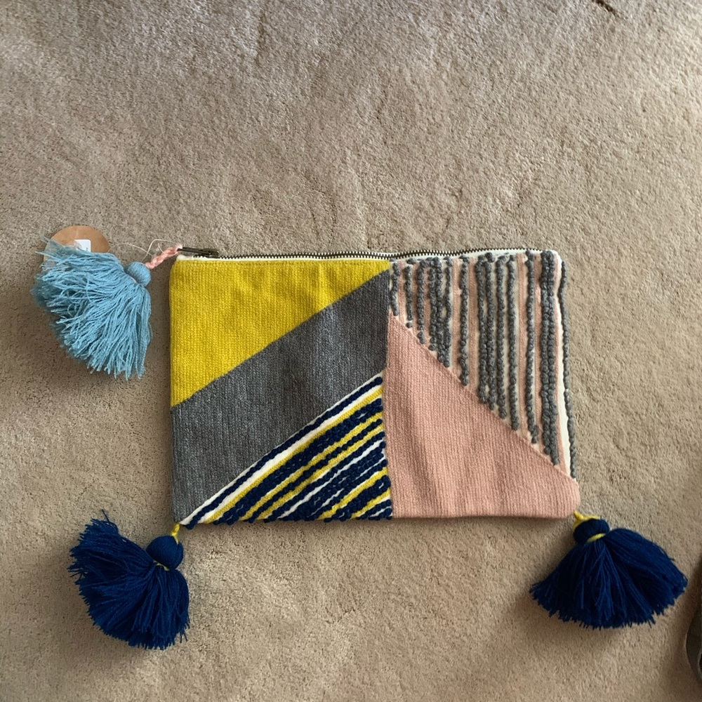 Brand New Paper Source zipper clutch with pompoms